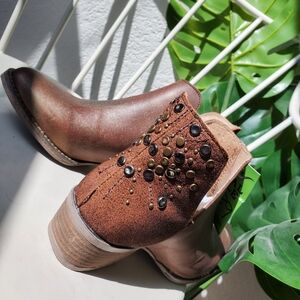 Brown and gold leather bootie with rivets